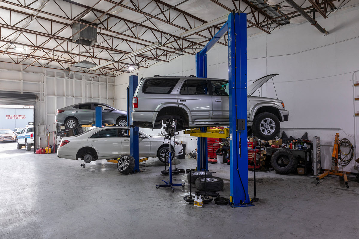Professional auto repair shop with modern equipment and clean workspace